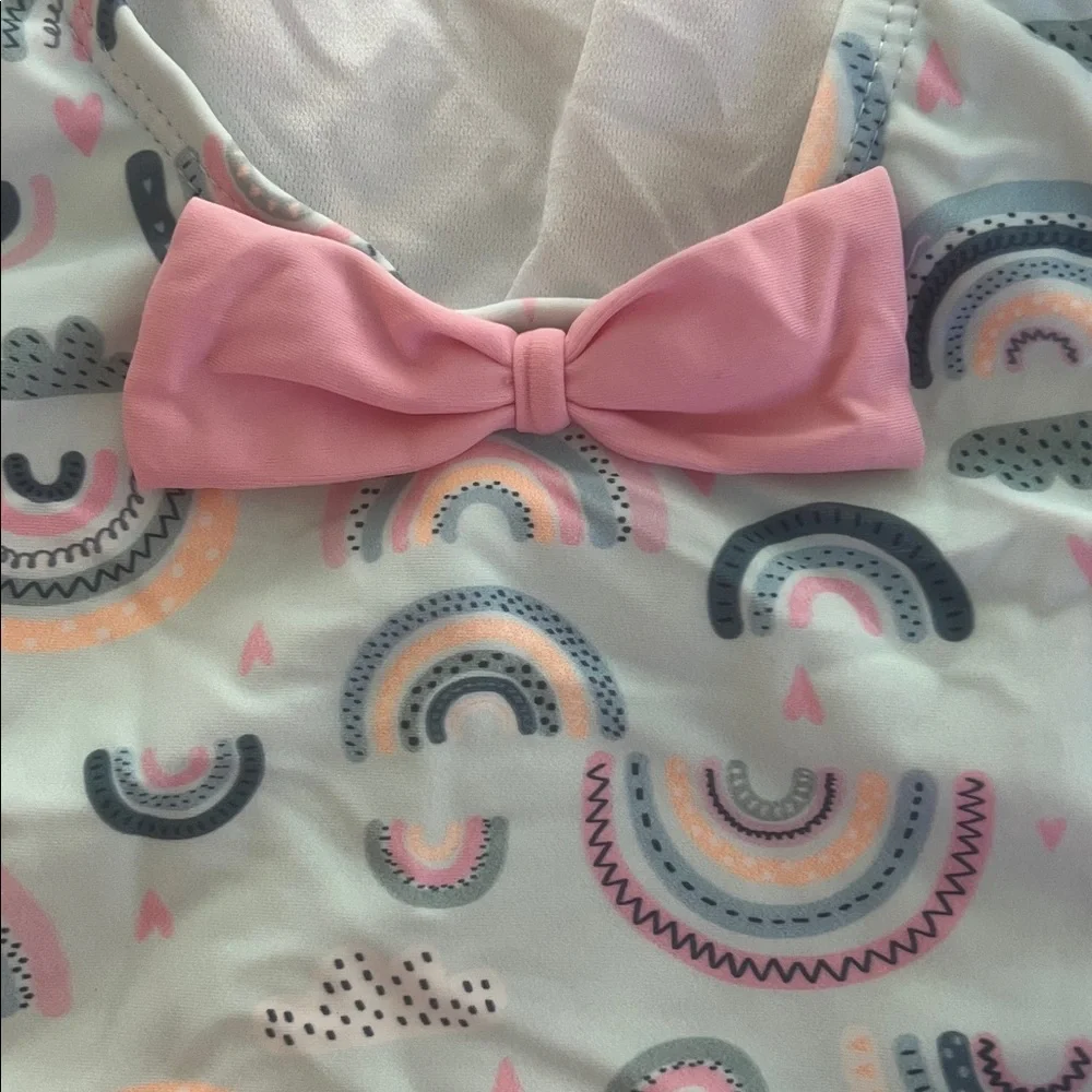 NWT RuffleButts Chase The Rainbow Waterfall Girls One Piece Swimsuit- back bow